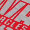 Close-Up View of Red Textured Soft Foam on Grey Shirt